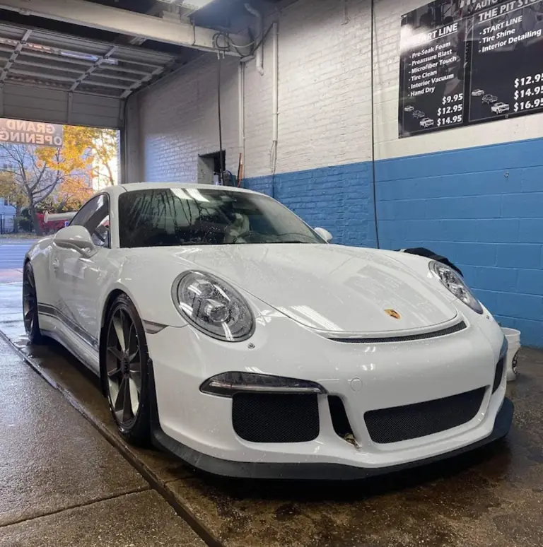 White Porsche 911 GT3 after a wash